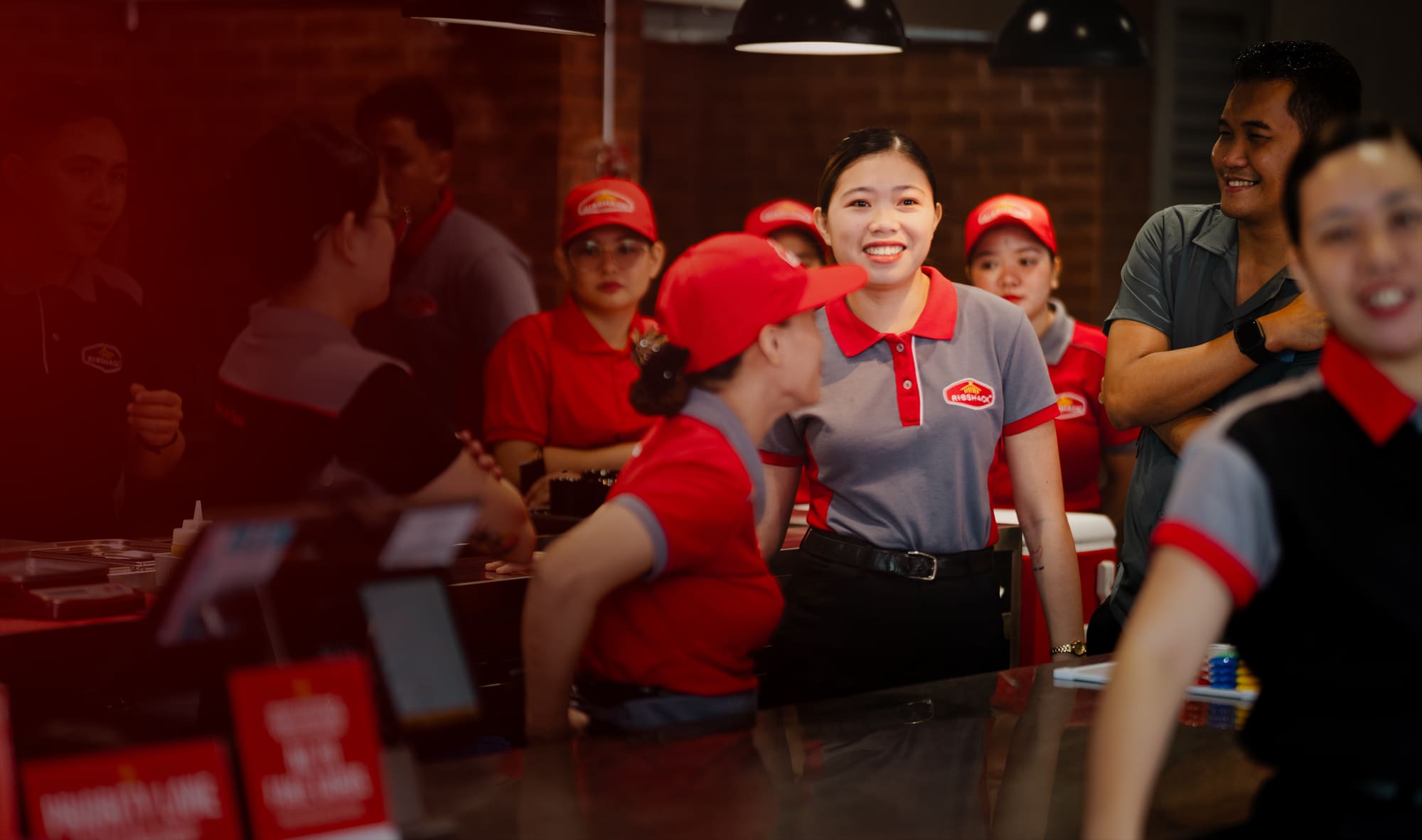 Ribshack crew serving customers at the counter